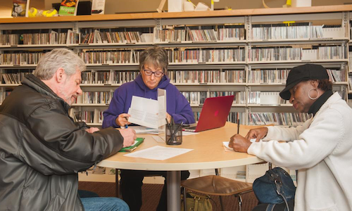 people filling out forms