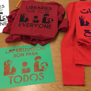 Libraries are for everyone prints in English, Spanish, and Arabic