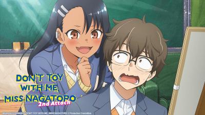 Cover image for the anime Don't Toy with Me, Miss Nagatoro. Shows two of the major characters sitting in a classroom, with one character leaning over the other's shoulder. 