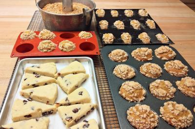 Scones and muffins on a cooling rack